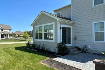 Modern sunroom Columbus Ohio white vinyl exterior residential addition