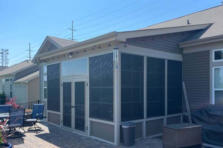 Eze Breeze porch Columbus Ohio vertical sliding windows outdoor space