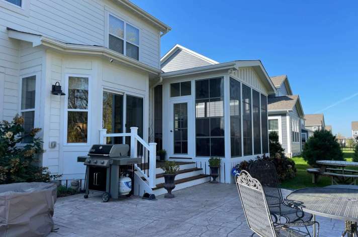 White Eze Breeze porch Columbus Ohio vinyl sliding windows