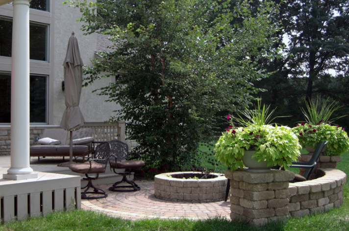 Suncraft Design Build custom paver patio with fire pit and landscape design Columbus Ohio