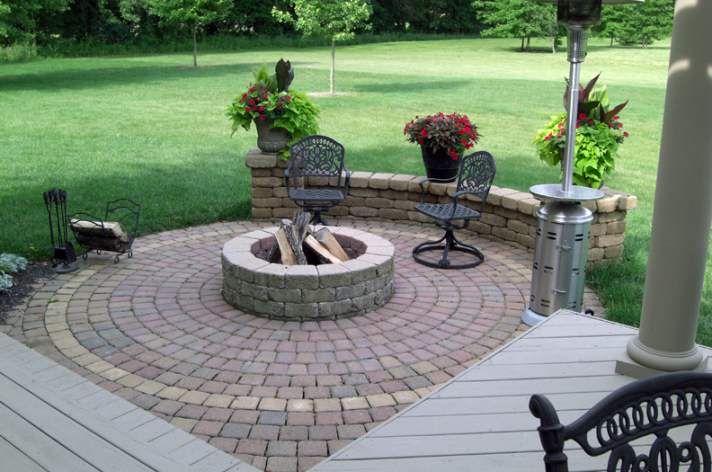 Suncraft Design Build custom circular fire pit with paver patio surround Columbus Ohio