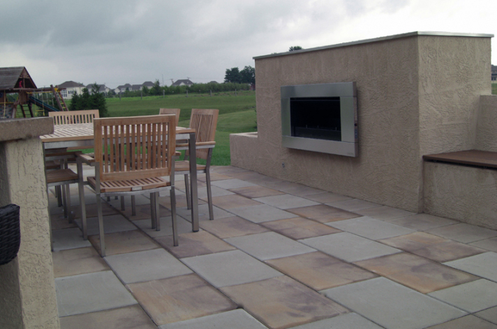 Suncraft Design Build custom outdoor fireplace with built-in seating wall patio Columbus Ohio