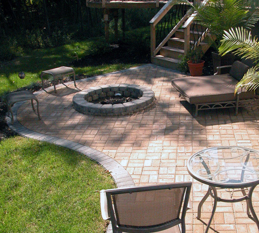 Suncraft Design Build custom outdoor fire pit with surrounding seating patio Columbus Ohio