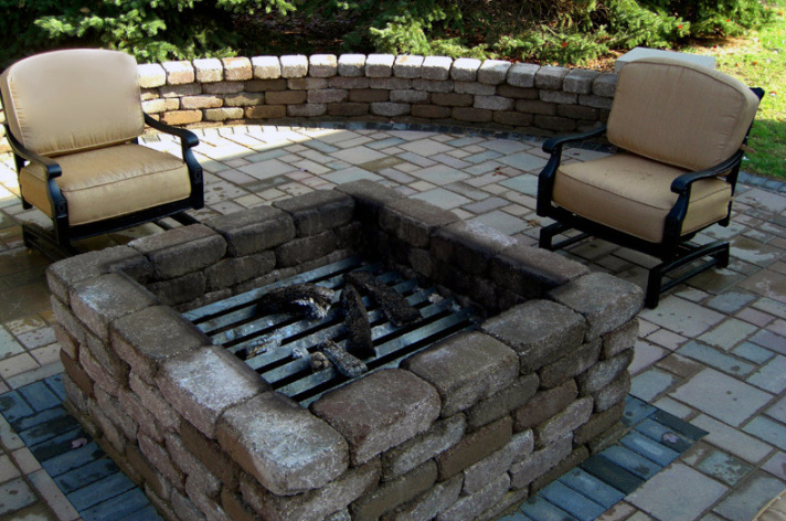 Suncraft Design Build custom outdoor fireplace with seating area backyard patio Columbus Ohio