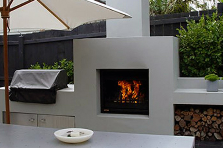 Suncraft Design Build custom outdoor masonry fireplace with tall chimney residential Columbus Ohio