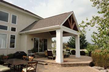 Suncraft Design Build custom open porch with gabled roof and outdoor seating Columbus Ohio