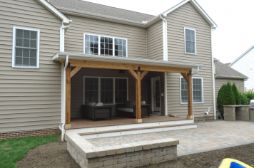 Suncraft Design Build custom open porch with timber frame gabled roof two-story home Columbus Ohio