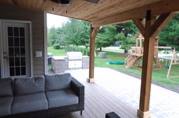 Suncraft Design Build custom open porch with outdoor seating attached residential home Columbus Ohio