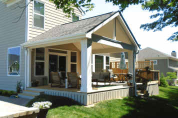 Suncraft Design Build custom open porch with white columns and gabled roof attached home Columbus Ohio