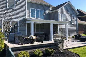 Suncraft Design Build custom open porch addition with outdoor kitchen attached two-story home Columbus OhioSuncraft Design Build custom open porch addition with outdoor kitchen attached two-story home Columbus Ohio