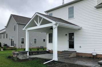 Suncraft Design Build custom open porch with white gabled roof and columns Columbus Ohio