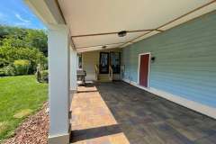 Suncraft Design Build custom paver patio with shade sail and outdoor dining Columbus Ohio