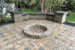 Suncraft Design Build custom paver patio with firepit and seating wall residential home Columbus Ohio