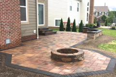 Suncraft Design Build custom paver patio with circular fire pit brick home Columbus Ohio
