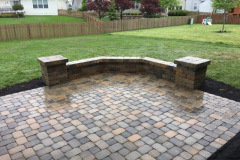 Suncraft Design Build custom curved paver patio with stone seating wall Columbus Ohio