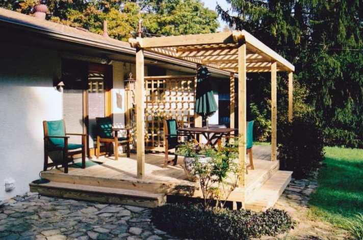 Suncraft Design Build custom wood pergola over deck with outdoor seating Columbus Ohio