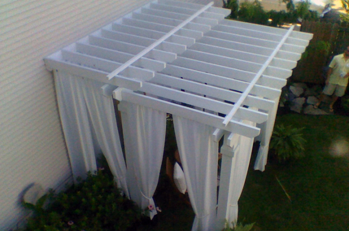 Suncraft Design Build custom pergola with open beam construction over patio Columbus Ohio