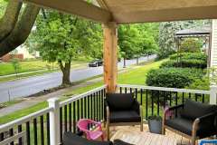 Suncraft Design Build custom open portico with timber beam ceiling and outdoor seating Columbus Ohio