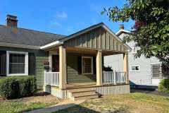 Suncraft Design Build custom portico with gabled roof and white columns small residential home Columbus Ohio