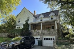Suncraft Design Build custom portico with stone columns and timber accents residential home Columbus Ohio