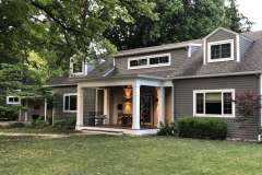 Suncraft Design Build custom small portico addition with white columns residential home Columbus Ohio