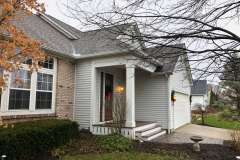 Suncraft Design Build custom portico restoration white columns brick ranch home Columbus Ohio