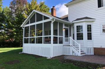 Screened porch interior Columbus Ohio ceiling fan furniture